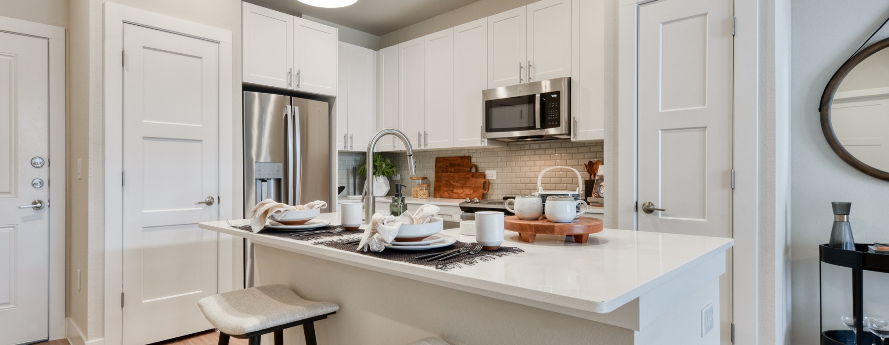 kitchen with island & stainless steel appliances