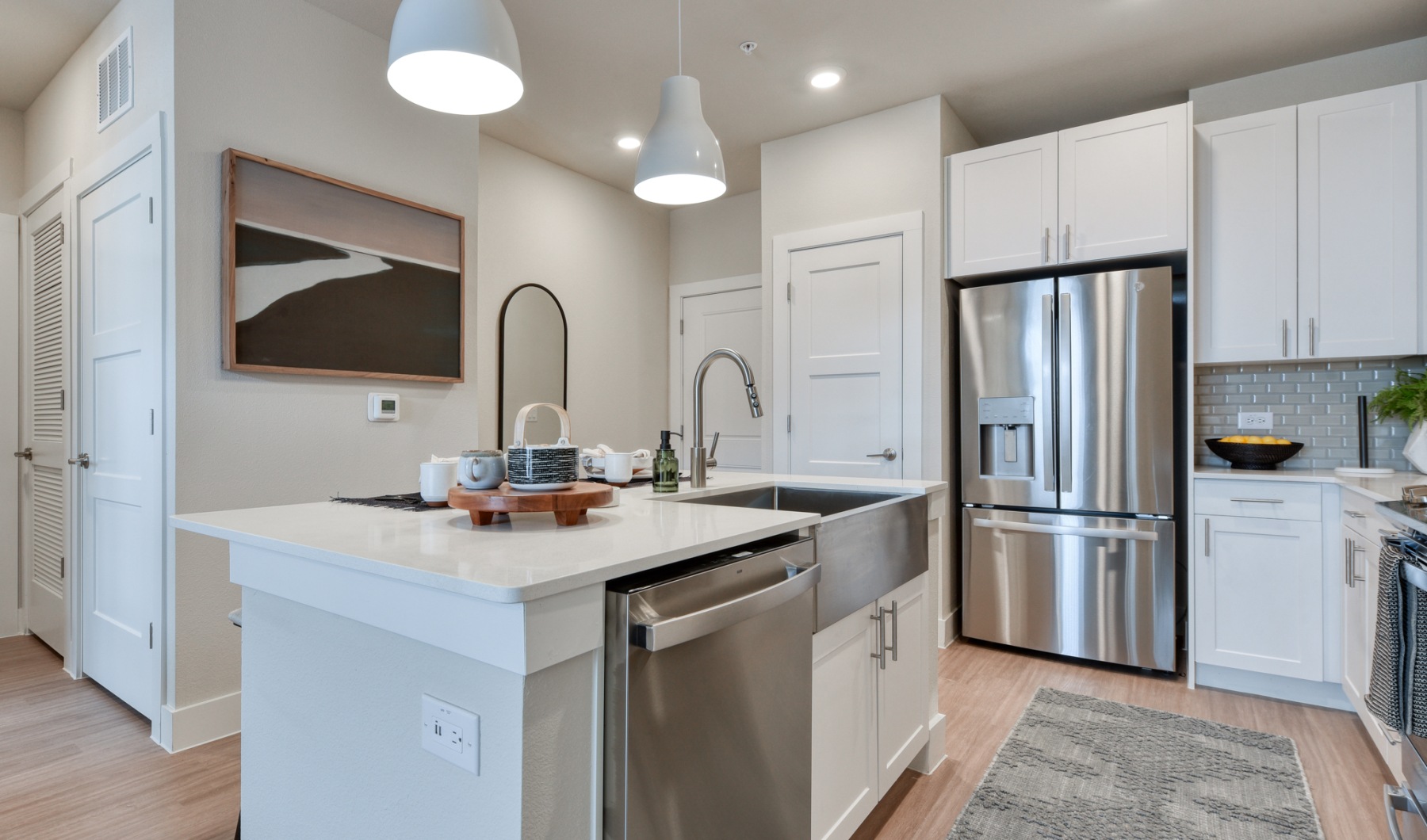 Kitchen with Island and Stainless Steel Appliances